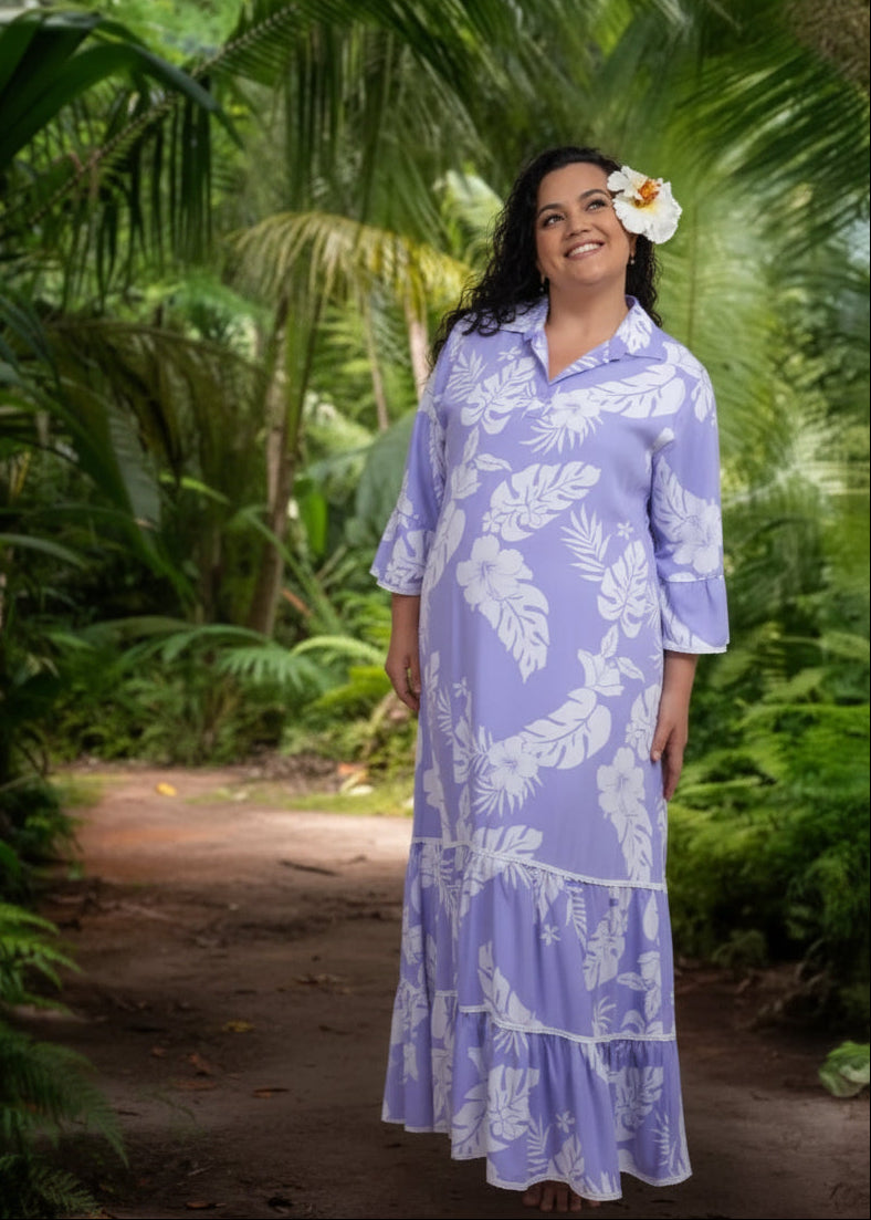 Woman wearing a traditional Pomare style long dress in lavender