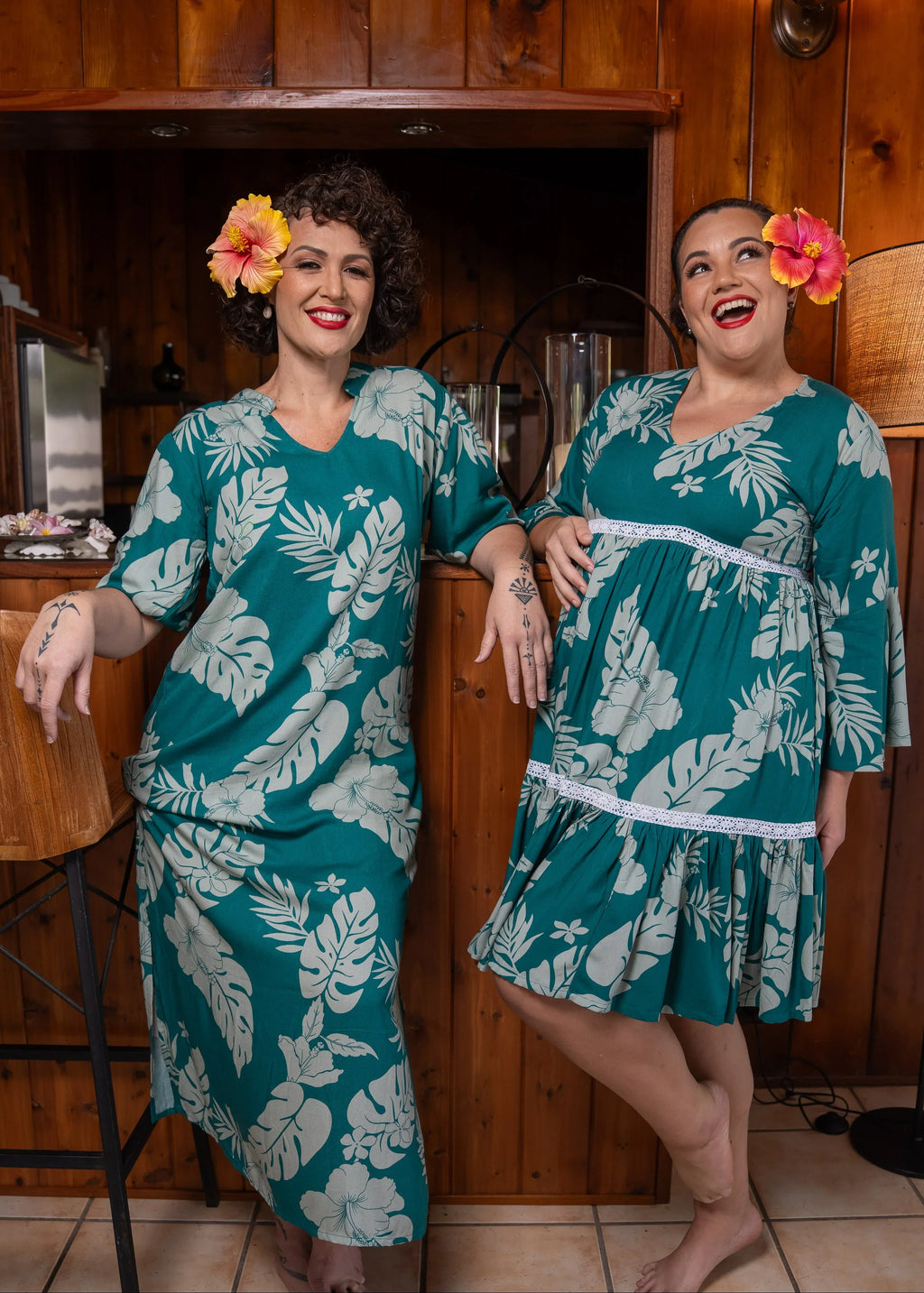 Woman wearing Bamboo Kultur’s “Merahi short” green Emerald Polynesian dress