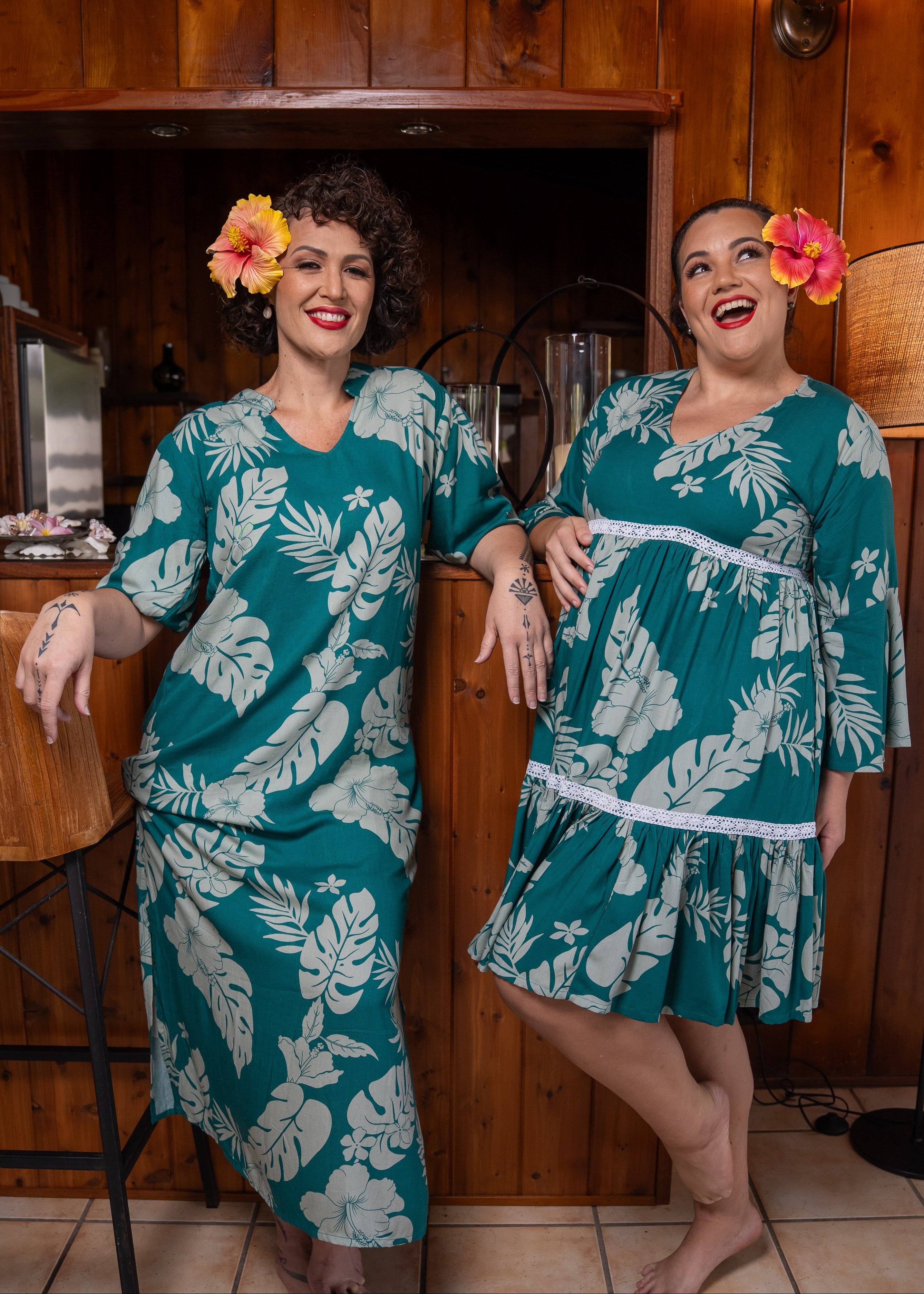 Woman wearing Bamboo Kultur’s “Merahi short” green Emerald Polynesian dress