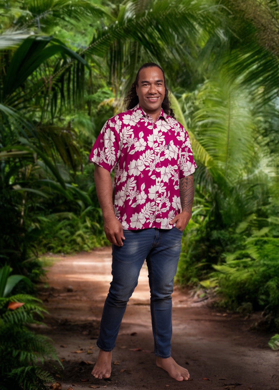Tahitian man wearing a blue Polynesian floral Bamboo Kultur shirt