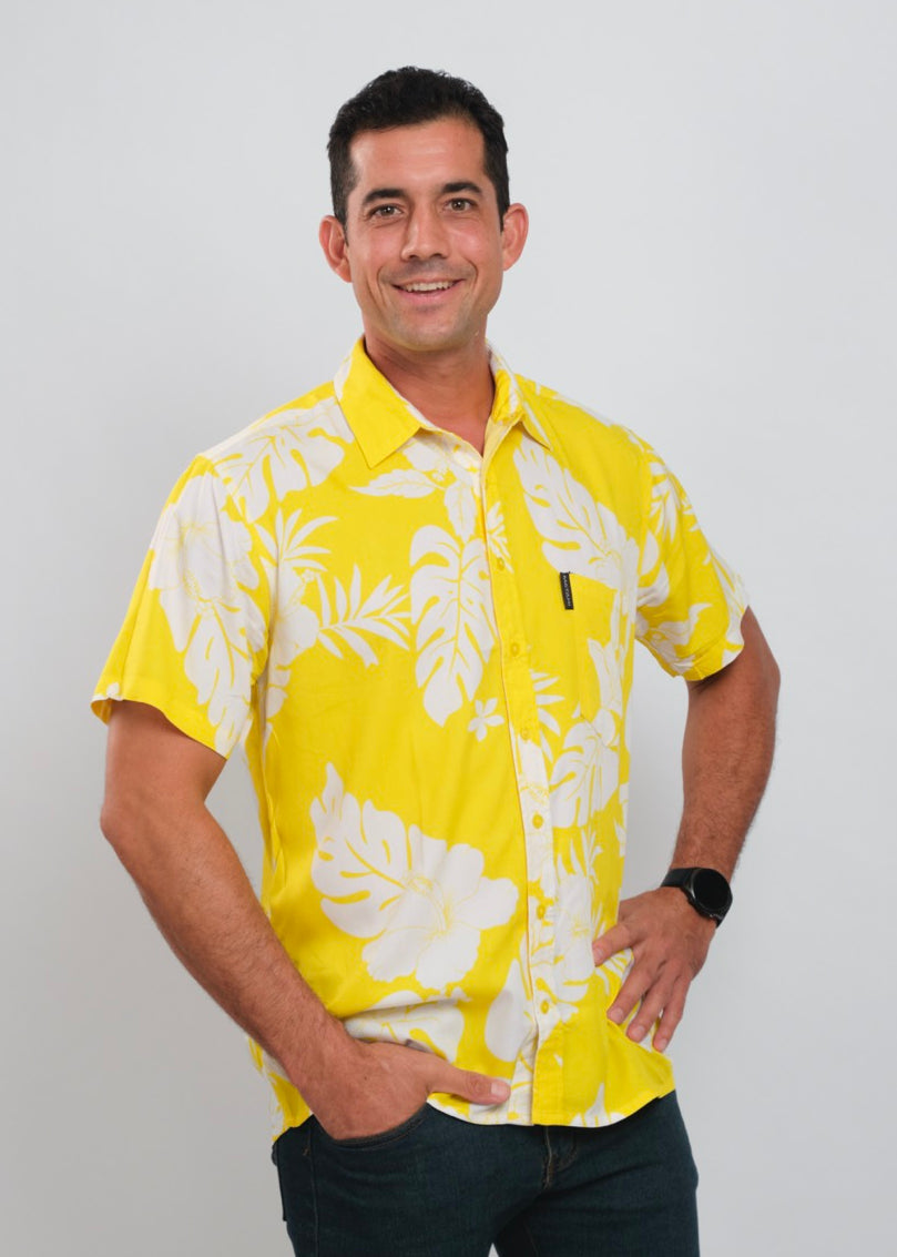 Tahitian man wearing a blue Polynesian floral Bamboo Kultur shirt