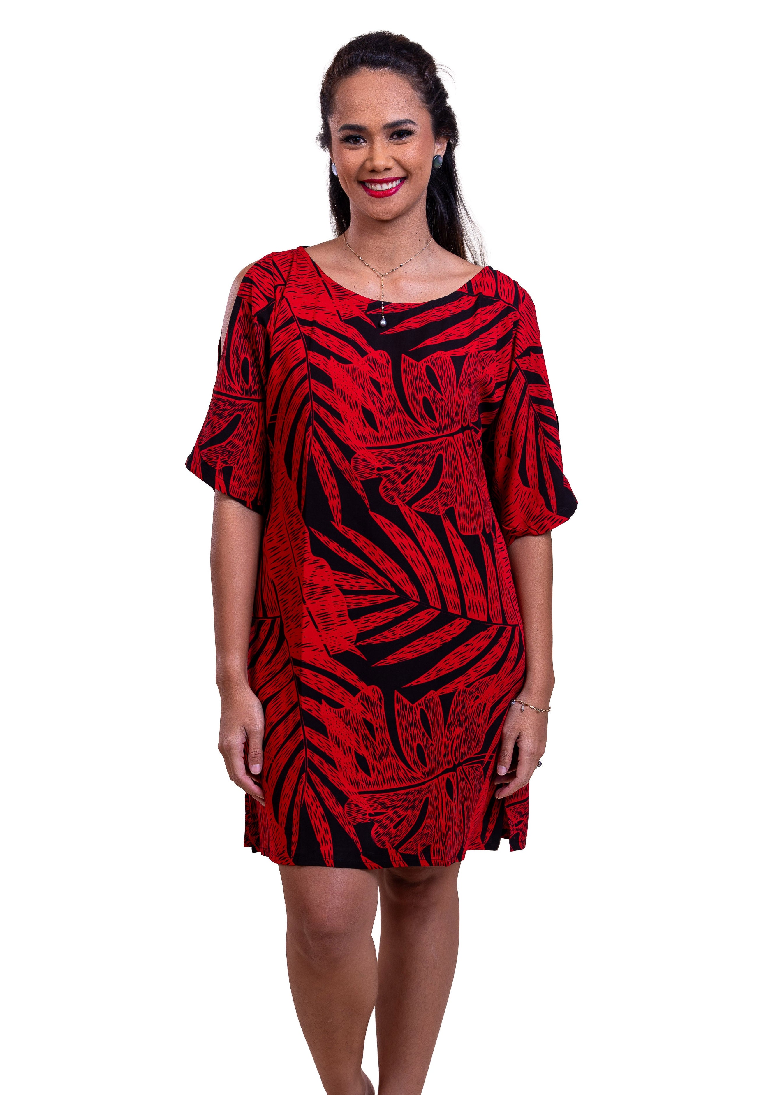 Vaimiki wearing the Teavei bamboo kultur in black an red leafy pattern , short version