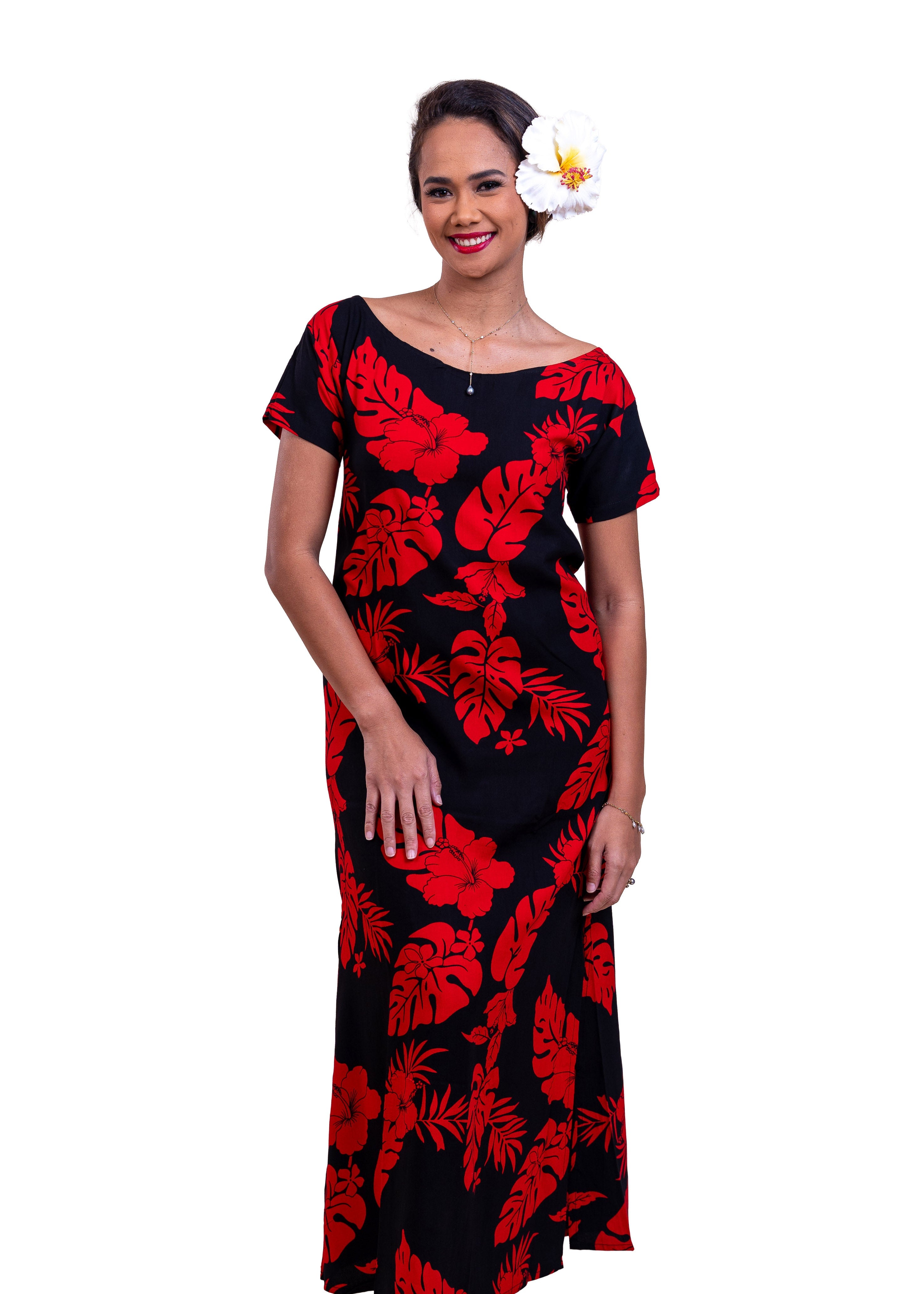 Vaimiki wearing the Vahine Bamboo kultur dress in black and red hibiscus patterns