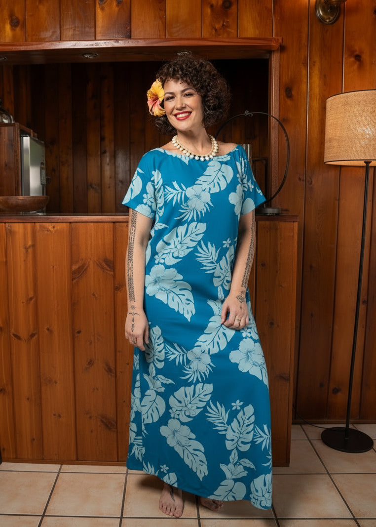 Bamboo Kultur’s “La Vahine” blue dress – a straight, flowy Polynesian-style dress embodying the femininity of the islands.